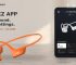 Orange Shokz OpenRun Pro 2 headphones beside the official Shokz app EQ screen